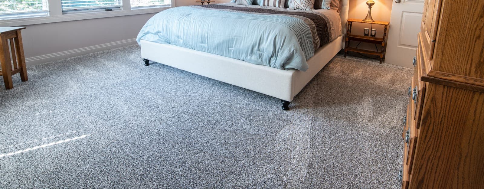 Bedroom carpet with fresh wand passes still visible after cleaning